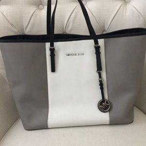 Grey and white Michael Kors tote